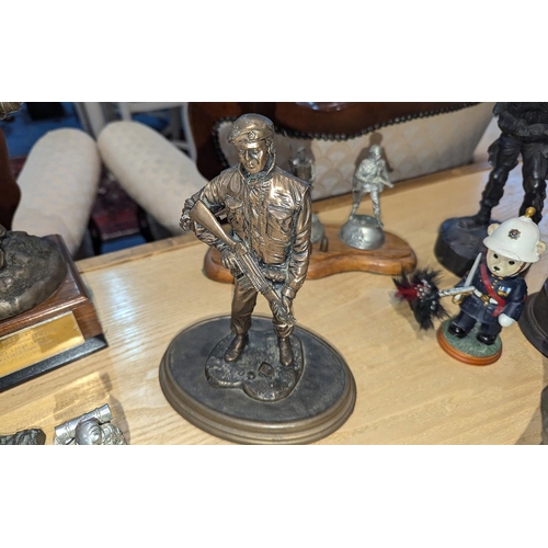 1309 - Collection of Metal Military Figures, all of military personnel, including The Gulf Veteran's Trophy... 