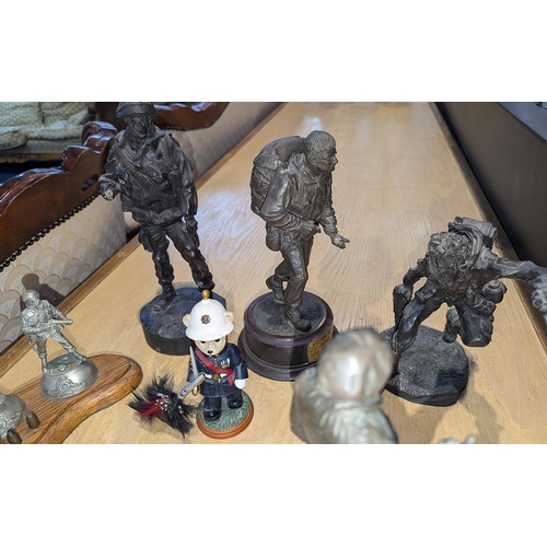 1309 - Collection of Metal Military Figures, all of military personnel, including The Gulf Veteran's Trophy... 