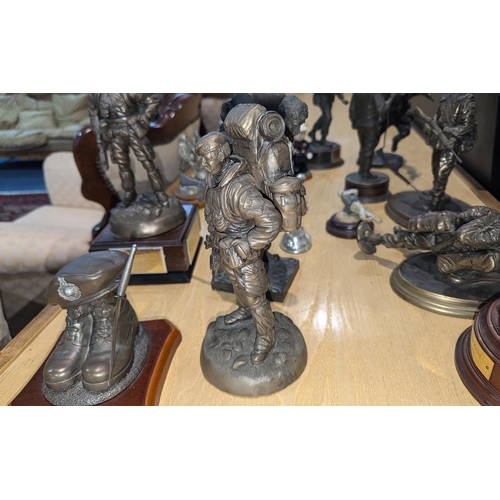 1309 - Collection of Metal Military Figures, all of military personnel, including The Gulf Veteran's Trophy... 