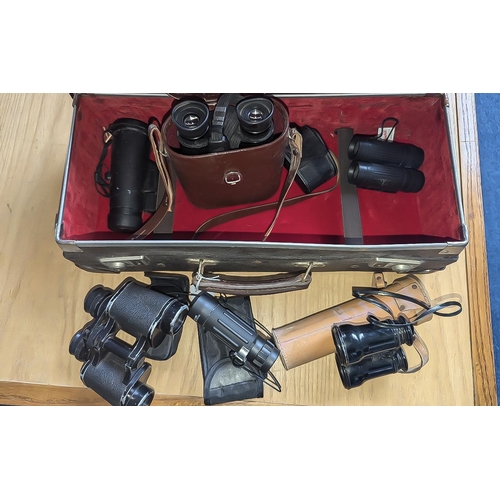 1312 - Case Containing a Collection of Binoculars, assorted makes and sizes.