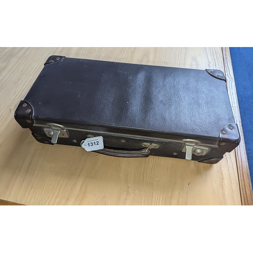 1312 - Case Containing a Collection of Binoculars, assorted makes and sizes.