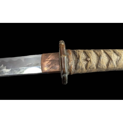 1319 - Large 19th Century Japanese Sword, in leather scabbard.  Measures approx. 40'' length.  Chagrin and ... 