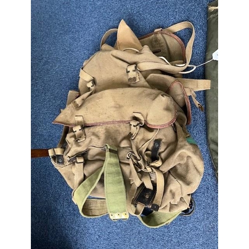 1340 - An Original Military Duffel Bag and Rucksack.