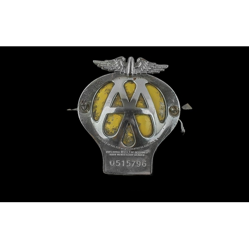 1442 - Vintage AA Badge, No. 0515796.  Chrome and yellow with winged top.