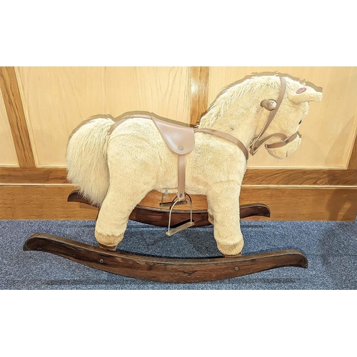 1504 - Child's Rocking Horse, raised on wooden rockers, cream fur, for the younger child, measures 24'' hig... 