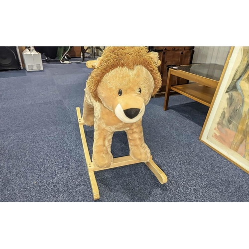 1505 - Child's Rocking Lion, raised on wooden rockers, cream fur, for the younger child, measures 24'' high... 