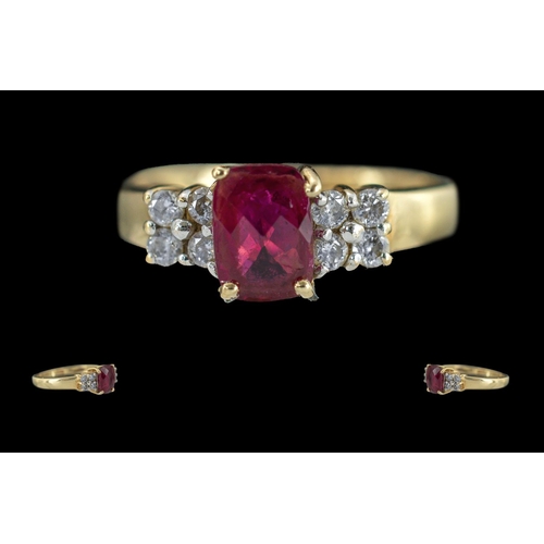 226 - Ladies 9ct Gold Diamond and Ruby Set Dress Ring. Marked 9ct to Interior of Shank. The Central Facete... 