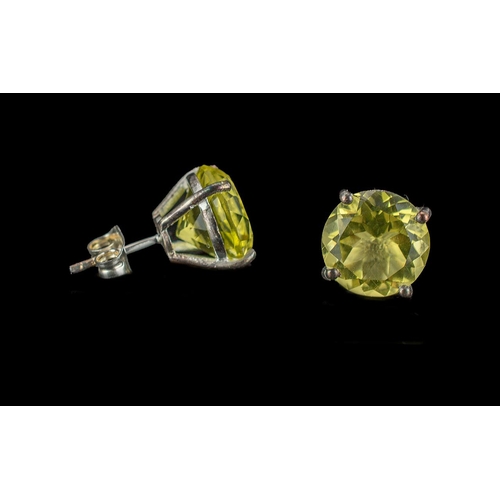 313 - Green/ Gold Quartz Large Stud Earrings, each of the round cuts of the unusual and natural green/ gol... 