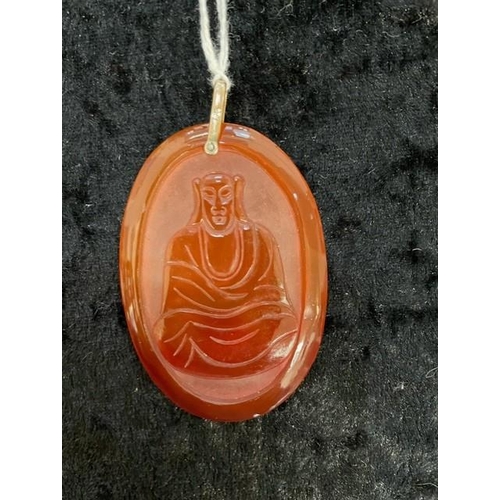 318 - Cornelian Double Sided Carved Buddha Pendant, the large, oval piece of good quality cornelian hand c... 