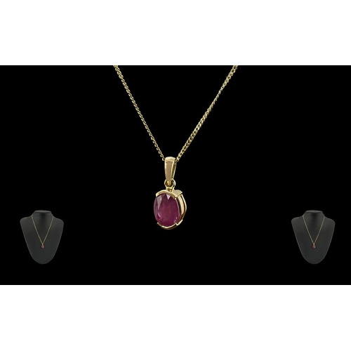 31A - Ladies 18ct Gold Royal Ruby Set Pendant Drop Attached to a 18ct Gold Chain. Both Pendant Drop and Ch... 