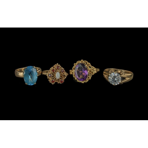 343 - Collection of Four 9ct Gold Dress Rings, set with blue, white and purple coloured stones.  Gross wei... 