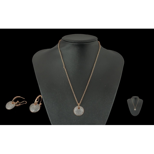 348 - Goldsmiths Boxed set of Pendant and Matching Earrings, rose gold tone with circular pendant set with... 