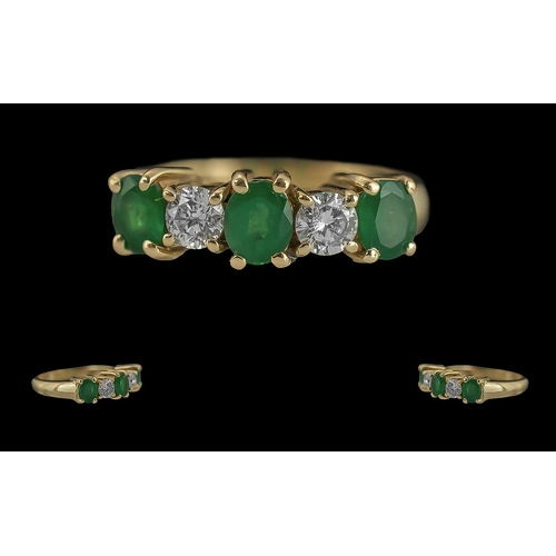 34A - Ladies 14ct Gold 5 Stone Emerald and Diamond Set Ring, Marked 14ct to Interior of Shank, The Emerald... 