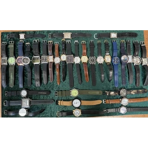 457A - Collection of Gent's Fashion Wristwatches, all fitted with new batteries and in working order, all l... 