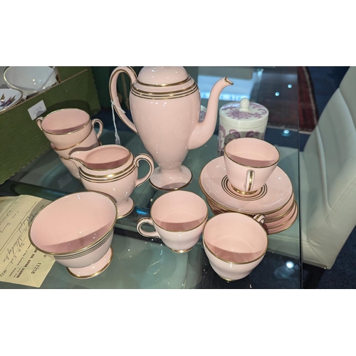 636 - Wedgwood April Pink Tea Set, No. 3278, comprising six cups, saucers, tea pot, milk jug and sugar bow... 