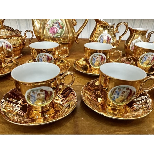 649 - Vintage Gilt Tea Set, comprising six cups and saucers, teapot, milk jug and creamer, lidded sugar bo... 