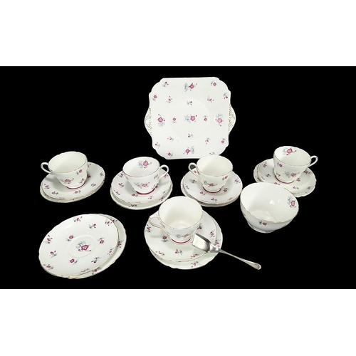 651 - Shelley 'Charm' Pattern No. 13752 part tea set, comprising five cups, six saucers, six side plates, ... 