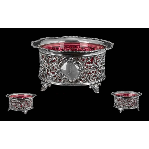 101 - Victorian Period Sterling Silver Open Worked Bowl with Cranberry Glass Inset, Raised on Four Ornate ... 