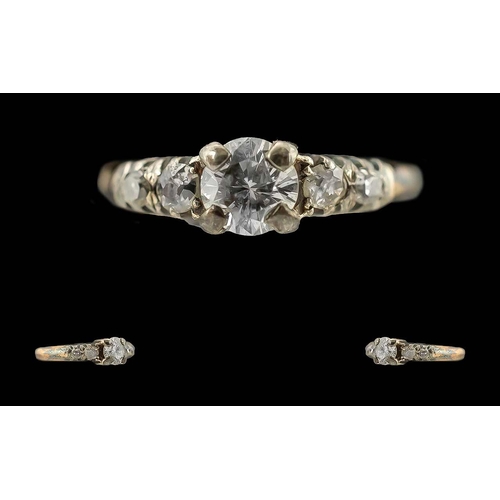 242 - Ladies Pleasing 18ct Gold Diamond Set Ring - Marked 18ct To Interior Of Shank. The Central Round Fac... 