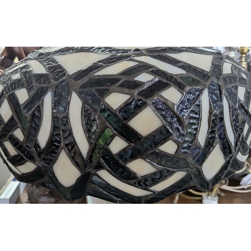 1041 - Large Tiffany Style Lamp, black and cream design, measures approx. 24'' tall.