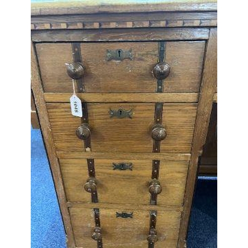 1043 - Twin Pedestal Oak Desk, with panelled back, leather top, two banks of three drawers and frieze drawe... 