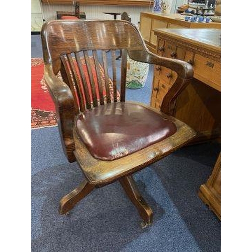 1043 - Twin Pedestal Oak Desk, with panelled back, leather top, two banks of three drawers and frieze drawe... 