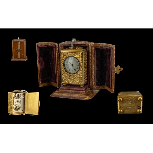 113 - Miniature Gilt Carriage Clock, Porcelain Dial, Arabic Numerals. Marked To Case Base SFG Depose Genev... 