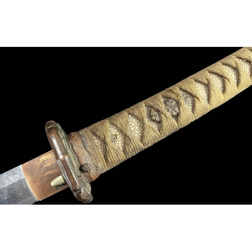 1319 - Large 19th Century Japanese Sword, in leather scabbard.  Measures approx. 40'' length.  Chagrin and ... 