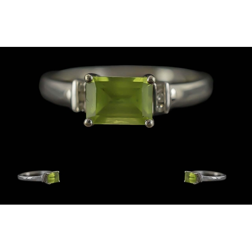 198 - Contemporary Ladies 9ct White Gold Diamond and Peridot Set Dress Ring, Hallmarked for 9ct Gold. Appr... 