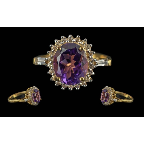 259 - Amethyst and White Topaz Classic Style Ring, a 3.25ct oval cut amethyst of wonderful colour and clar... 