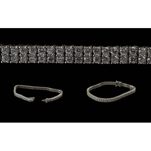 298 - Silver Tennis Bracelet, set with a double row of CZ stones, full hallmark for CZ and silver.  7.5'' ... 