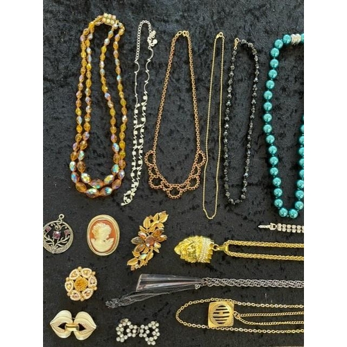 408A - A collection of assorted vintage costume jewellery including brooches, necklaces, fox brooch, beads,... 