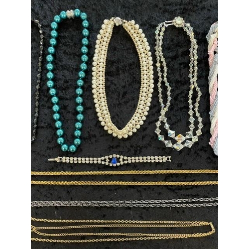 408A - A collection of assorted vintage costume jewellery including brooches, necklaces, fox brooch, beads,... 