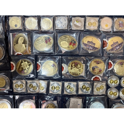 417 - Collection of Windsor Mint Collectible Commemorative Coins, mostly gold plated, including German cit... 