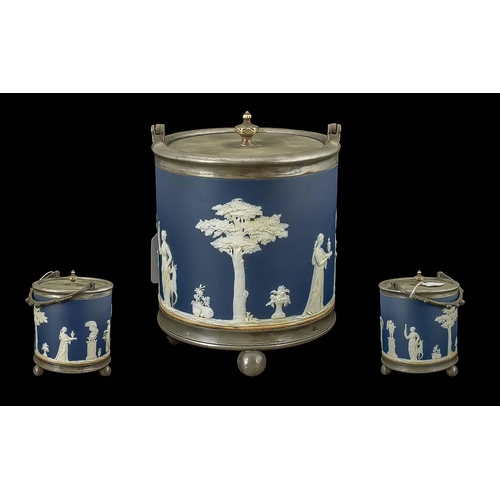 535 - Wedgwood Biscuit Barrel. Antique Wedgwood Biscuit Barrel In Blue with Relief Decoration throughout.