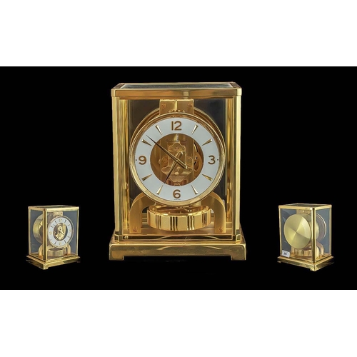 99 - Jaeger - Le Coultre Gilt Brass Classic Atmoss Perpetual Movement Clock. c.1950's. Height 9 Inches - ... 