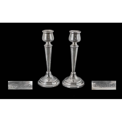 104 - 1930s Pair of Sterling Silver Tulip Shaped Candlesticks, raised on round, stepped bases of pleasing ... 