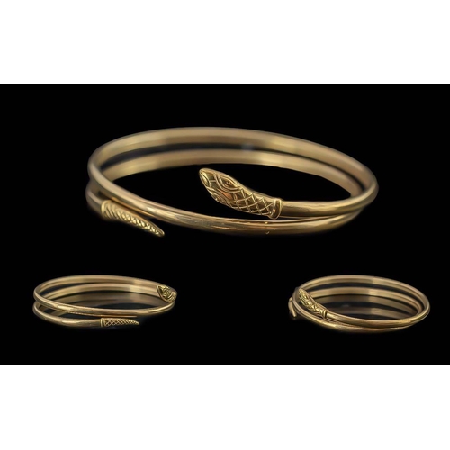 25A - Fine 9ct Gold Coiled Snake Bangle of realistic form, tests 9ct, warm coloured gold, weight 18.7g