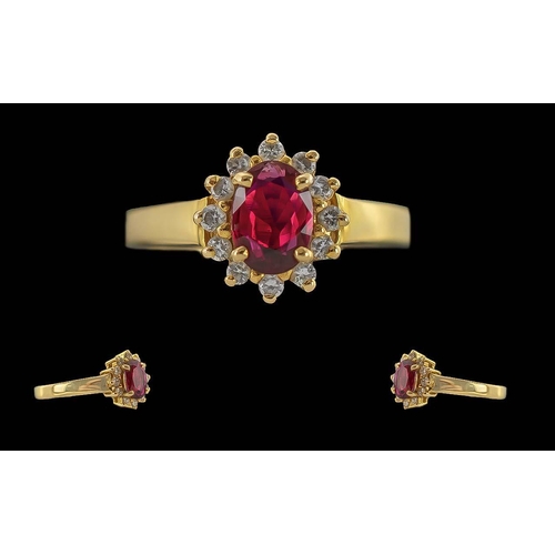 4 - Ladies 18ct Gold Ruby and Diamond Set Dress Ring, Marked 750 - 18ct to Interior of Shank. The Centra... 