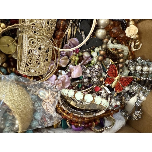 435 - Large Quantity of Costume Jewellery, contained in a banana box, comprising bangles, bracelets, beads... 