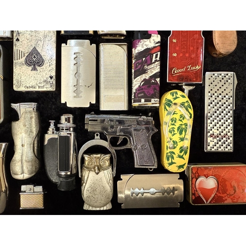 444A - Collection of Novelty Cigarette Lighters, approx 20, some modelled in the form of pistols, cars, etc... 