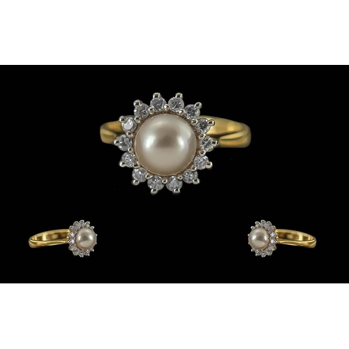 46A - Ladies 18ct Gold Pearl And Diamond Set Cluster Ring, Flower head Setting. Marked 750 - 18ct to Shank... 