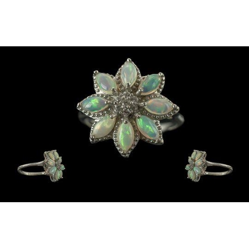 483A - Attractive Quality Opal Floral Ring, the flower comprising eight marquise cut opal cabochons, with g... 