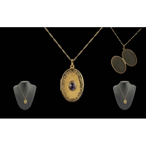 53 - Ladies - Pleasing 9ct Gold Amethyst Set Hinged Locket of Oval Form, Attached to a 9ct Gold Fancy Cha... 