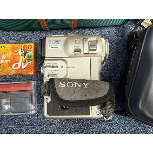 1104 - Sony Digital Video Camera Recorder, Model DCR-PC1E, complete with mini DV cassettes, new battery and... 