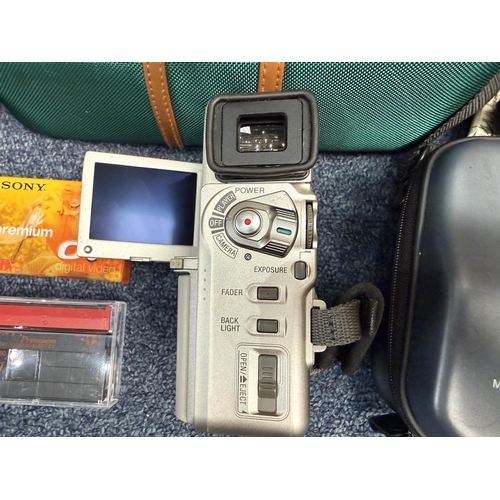 1104 - Sony Digital Video Camera Recorder, Model DCR-PC1E, complete with mini DV cassettes, new battery and... 