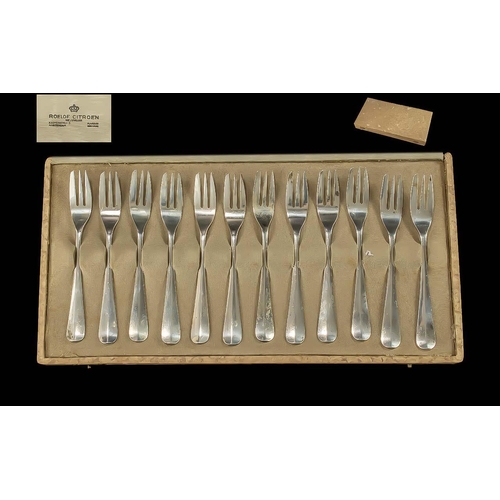 128 - Cased Set of Twelve Silver Continental Cake Forks, continental marks 900 purity.