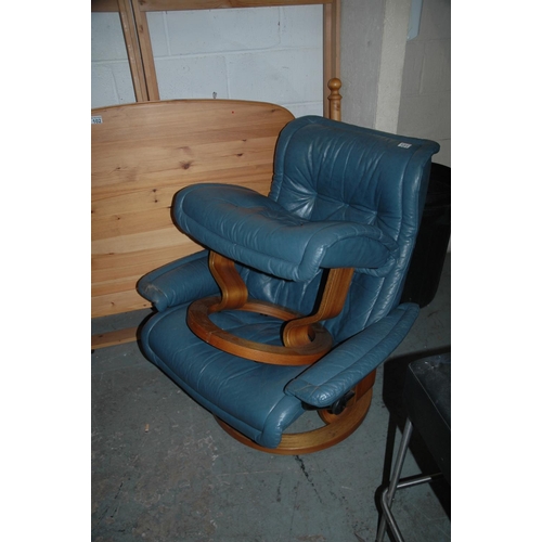 101 - Leather easychair & stool