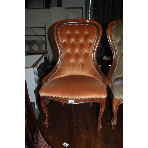 109 - Orange salon chair