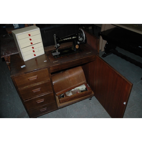 155 - Singer sewing machine cabinet